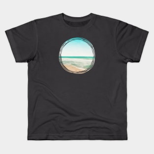 Beautiful ocean beach with big sky Kids T-Shirt